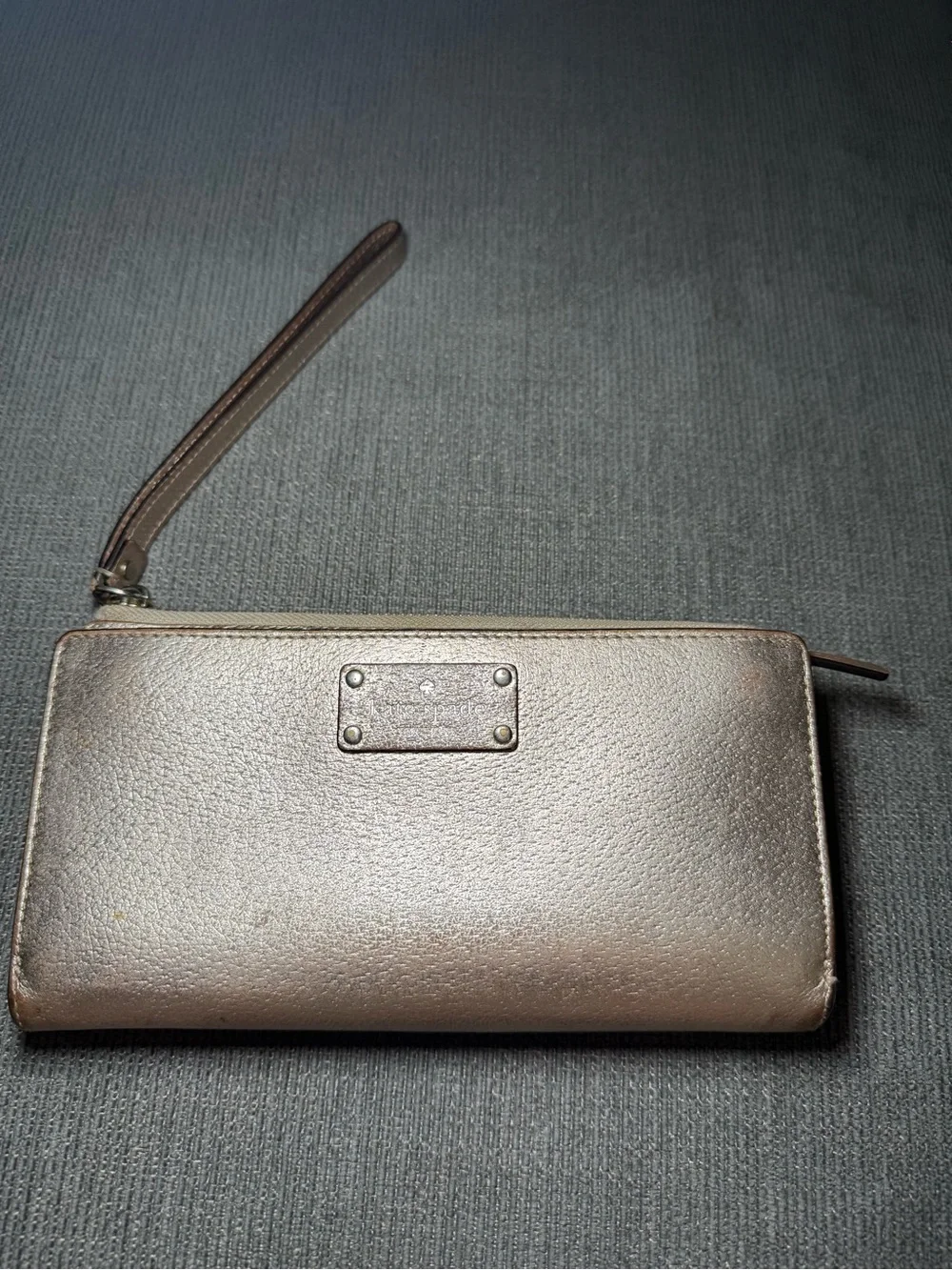 Kate spade Metallic Rose Gold Wristlet Wallet with Zip Closure
